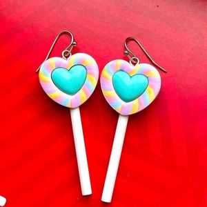 Lollipop dangle earrings.
